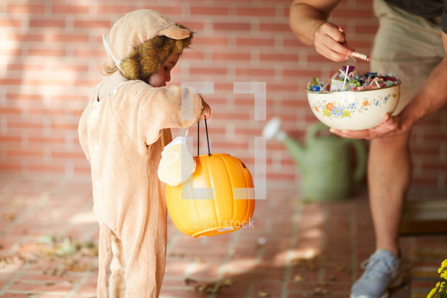 a child trick-or-treating 