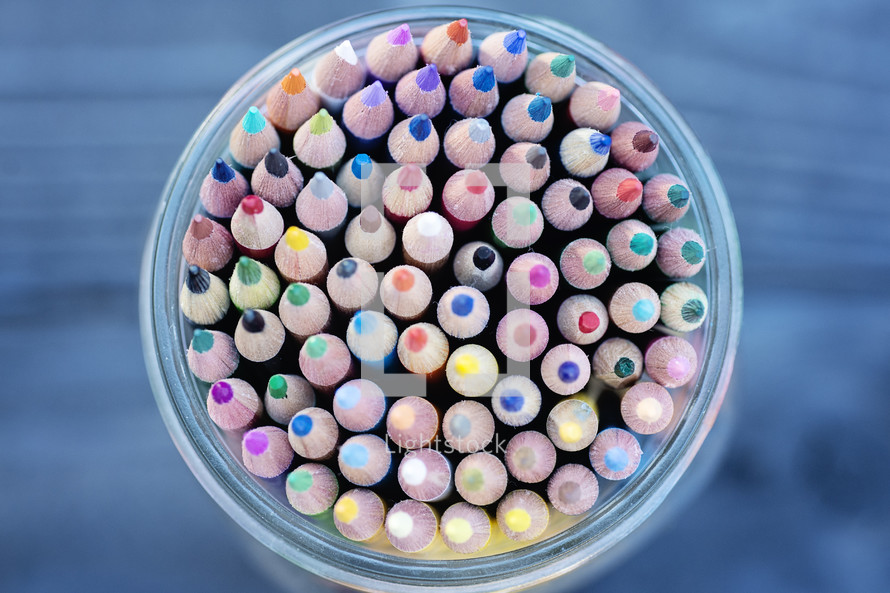sharpened colored pencils in a mason jar 