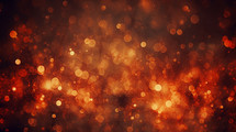 Moody fire abstract painted background with bokeh. 