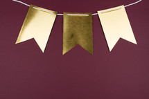 blank gold banner on maroon 