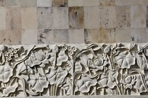 carved flowers in stone border 