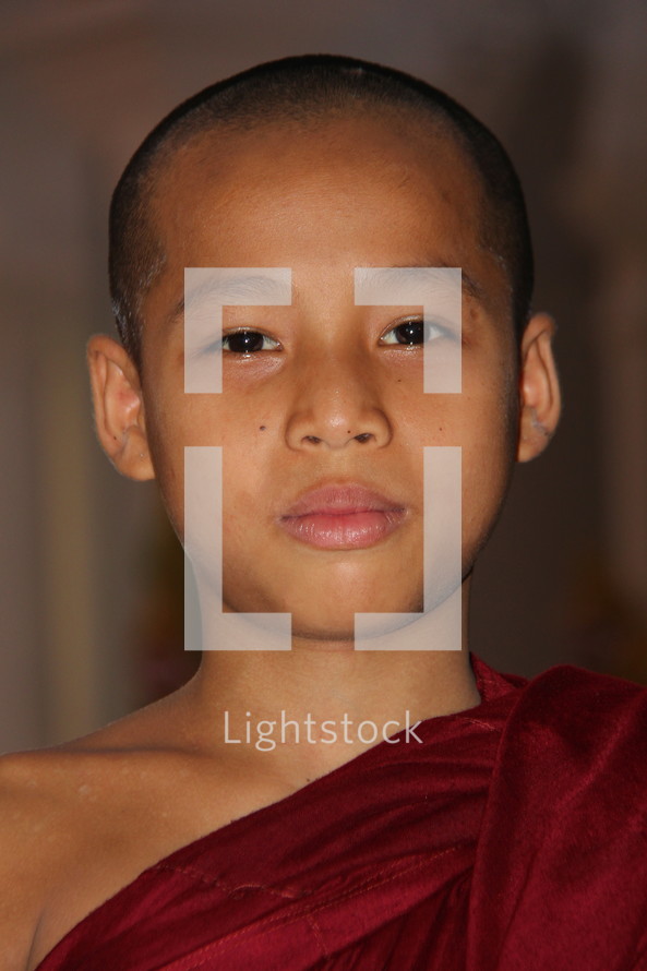 Face of a Buddhist novice monk