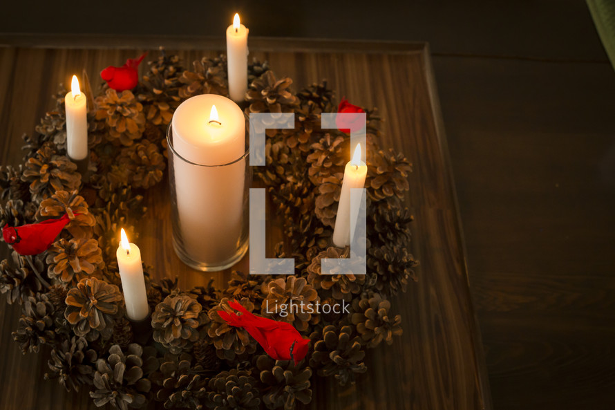 pine cone wreath and candles 