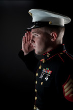 a Marine saluting 