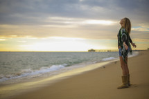 woman standing on a beach