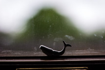 whale decoration in a window