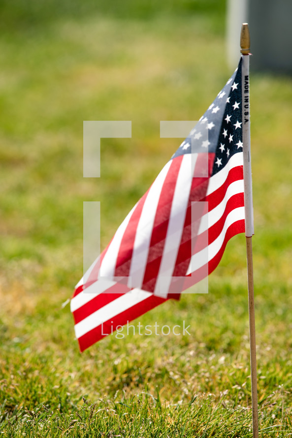 American flag in the ground 