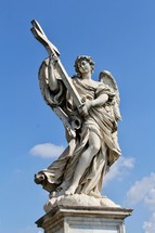 angel holding a cross