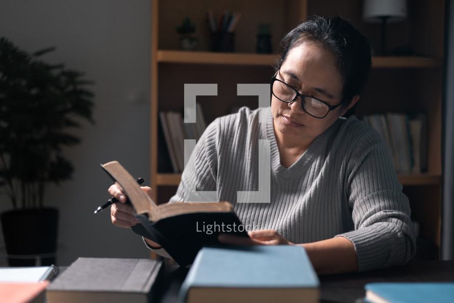 Woman reading a Bible 