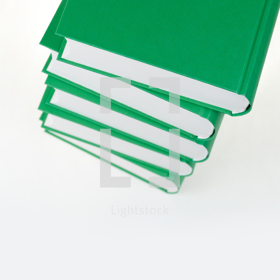 stack of green books 
