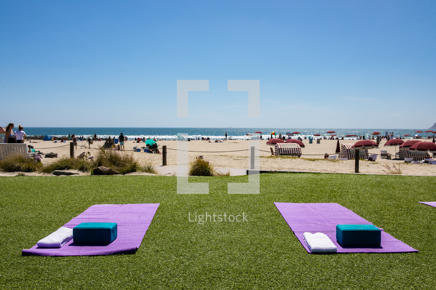 yoga mats with a beach view 