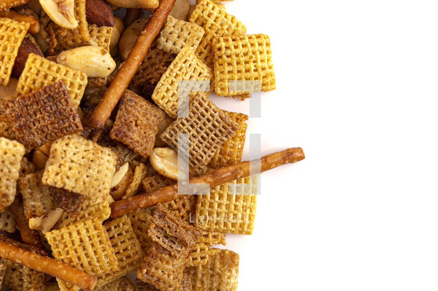 Chex mix on a white background