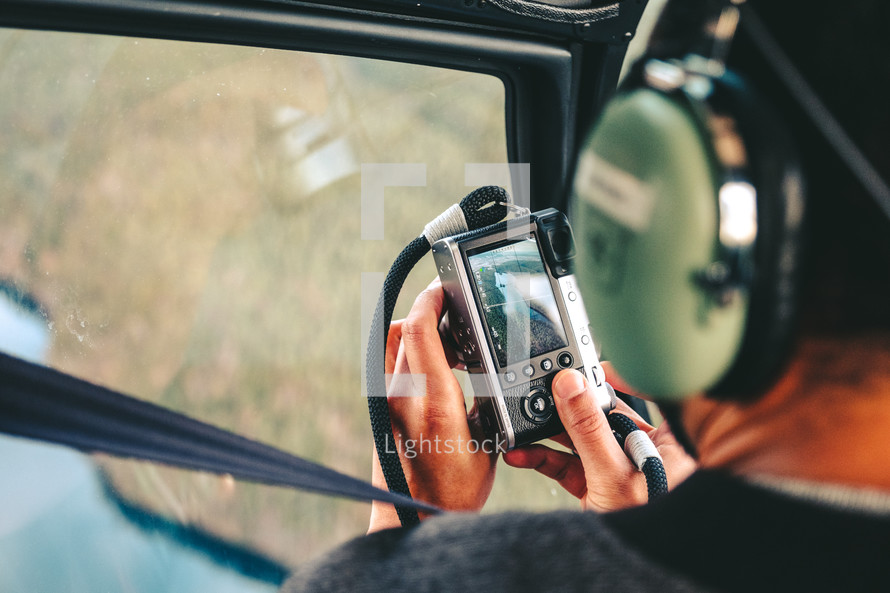 photographing out of a helicopter 