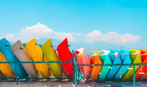 colorful row of canoes 