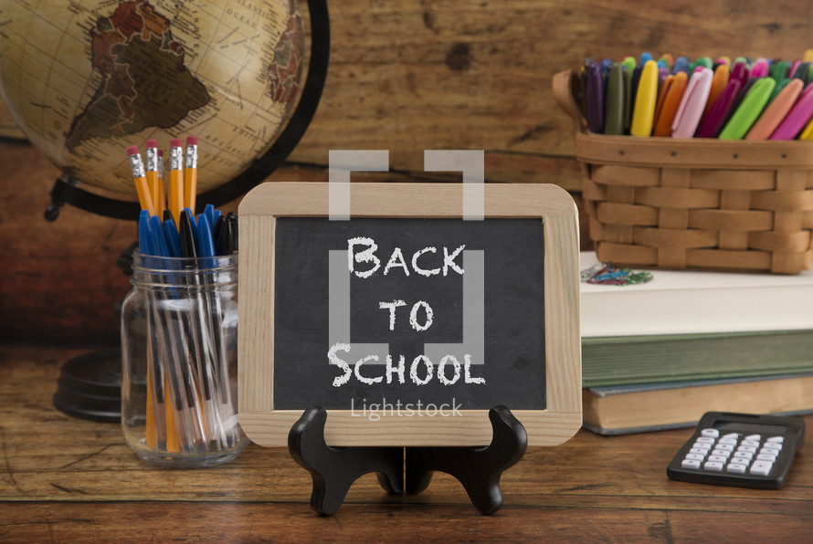 Back to School Themed Background on a Wooden Table