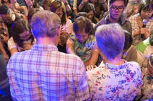 lying on of hands during a worship service 