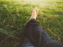feet in the grass 
