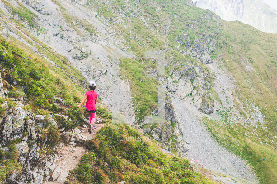 girl on a mountain trail 