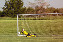 soccer goalie in the net 