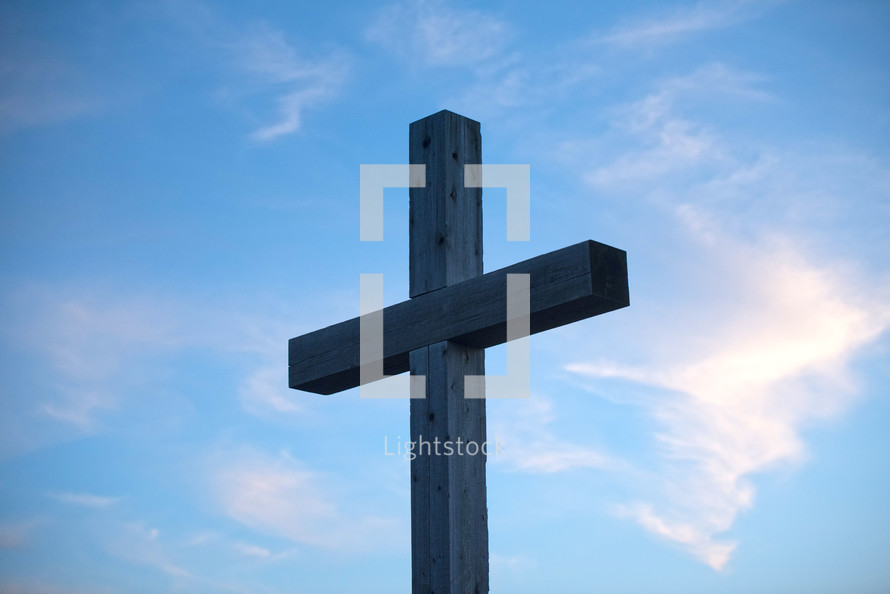 cross against a sky at sunset