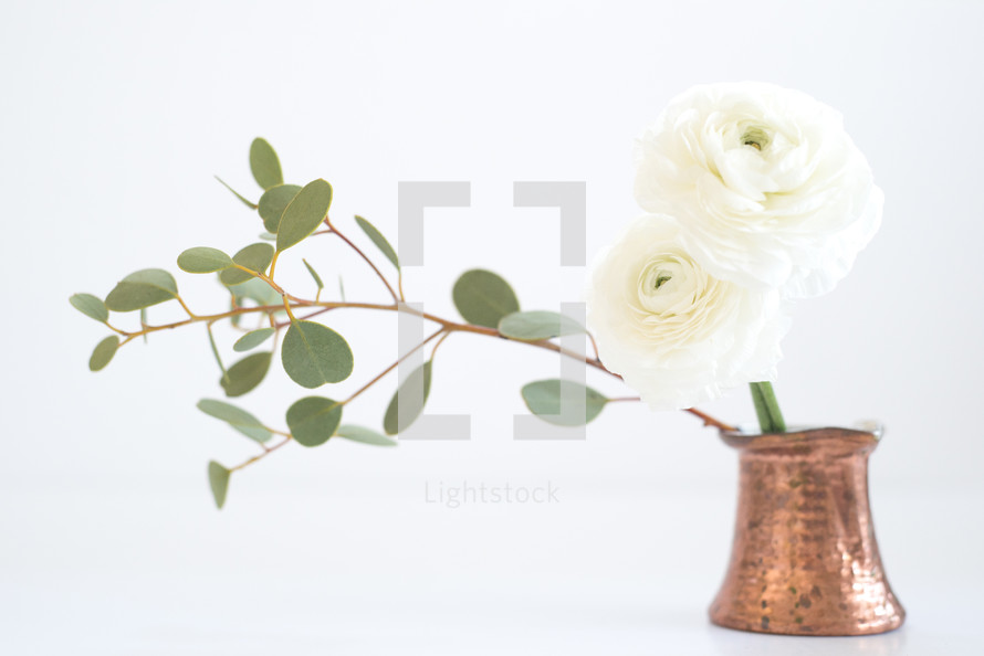flowers and eucalyptus in a vase 
