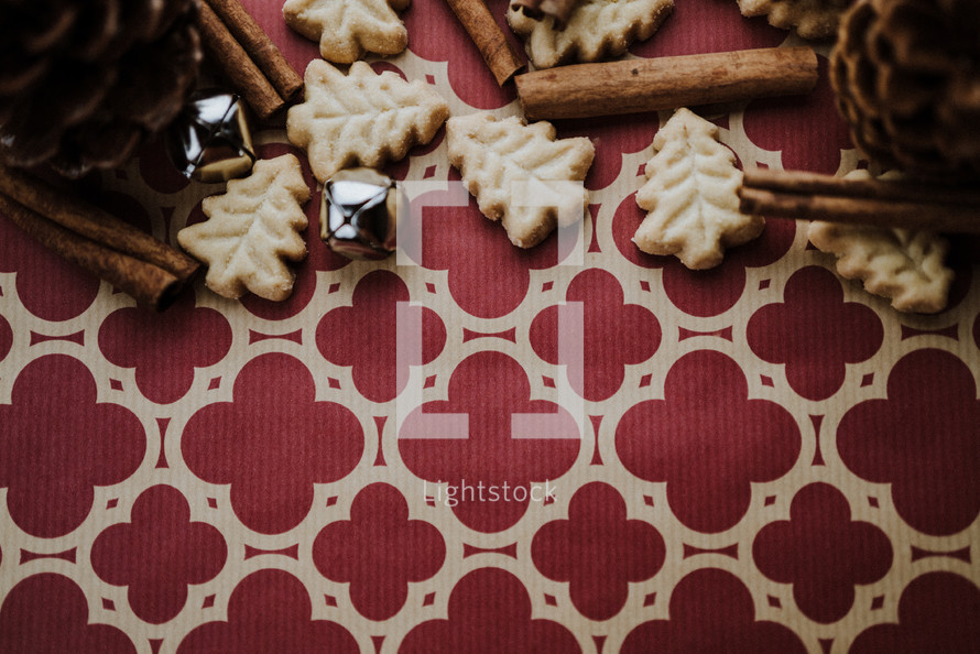 Christmas tree sugar cookies and cinnamon sticks border 