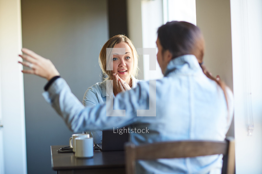 women catching up over coffee 