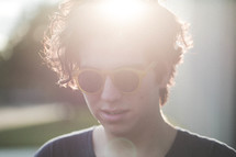 sunglasses on a teen boy