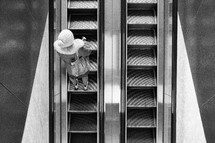 a person on an escalator 
