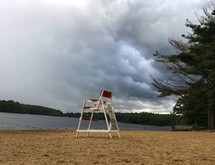 lifeguard chair on a lake shore 