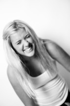 face of a laughing young woman 