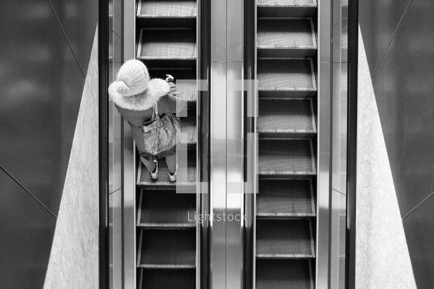 a person on an escalator 