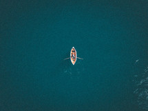 aerial view over a boat on water 