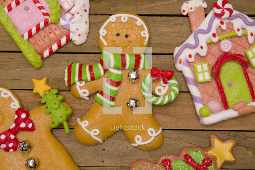 gingerbread man, Christmas tree, and gingerbread house cookie 