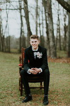 teen boy in a tuxedo 