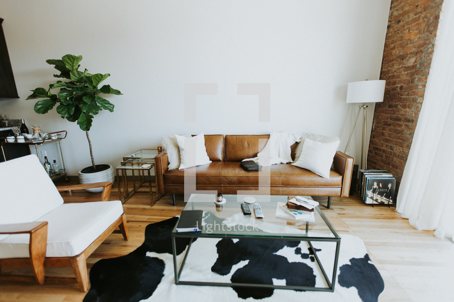 cow rug in a living room 