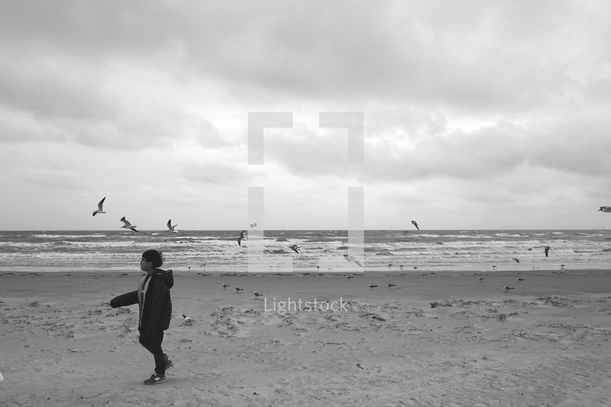 child walking on a beach 
