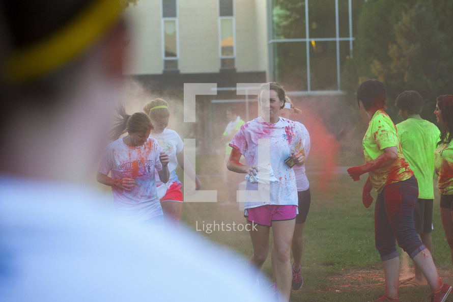teens running a color run