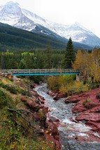 mountain bridge over a river 