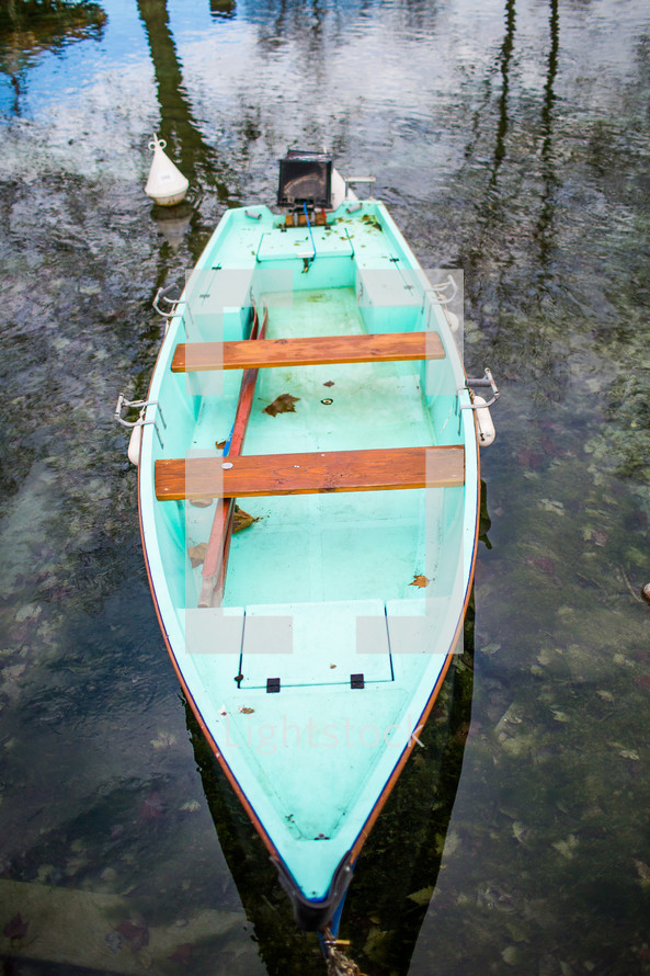 a boat floating on a pond in France 