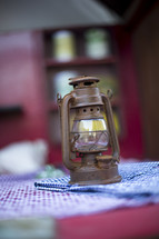 Lantern on a table.