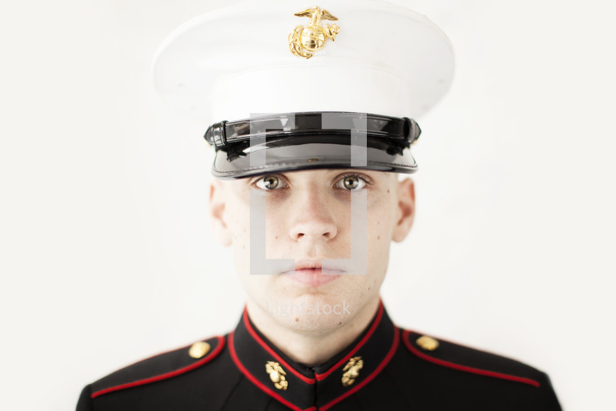 Marine in uniform, staring at the camera. 