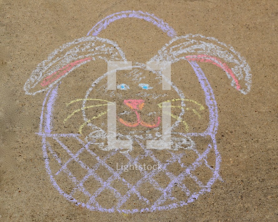 Easter bunny in an Easter basket drawing in sidewalk chalk 