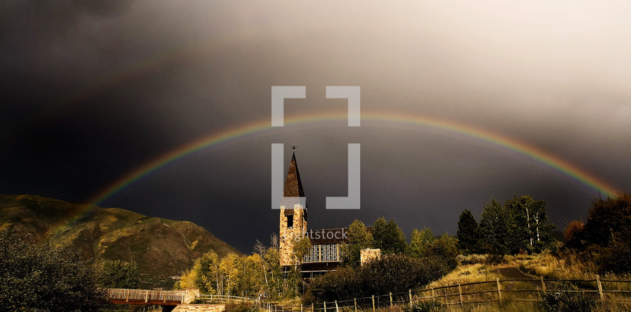 double rainbow over a chapel