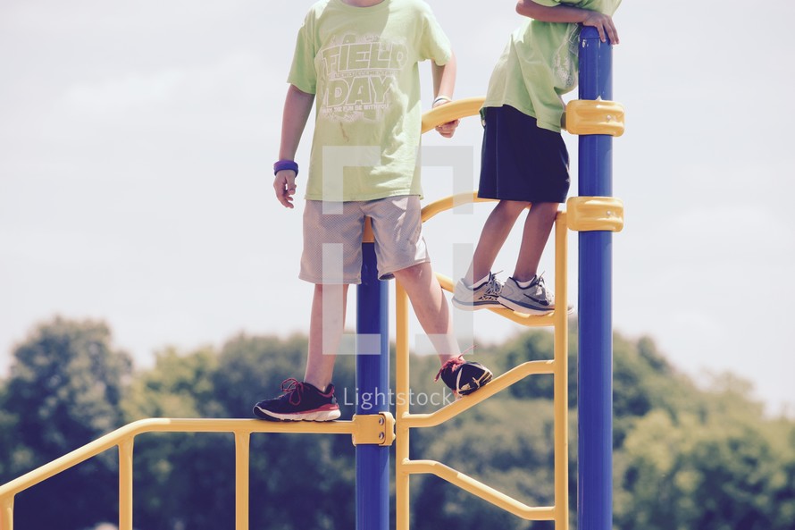 kids climbing playground equipment 