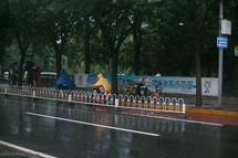 bicyclists driving in the rain 