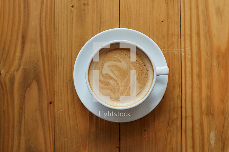 latte on a wood table 