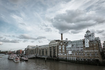 boats and buildings along the river Thames 
