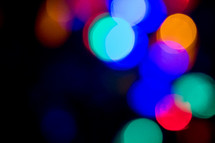 colorful bokeh lights in darkness 