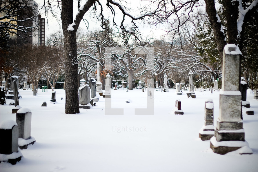 snow covered cemetery